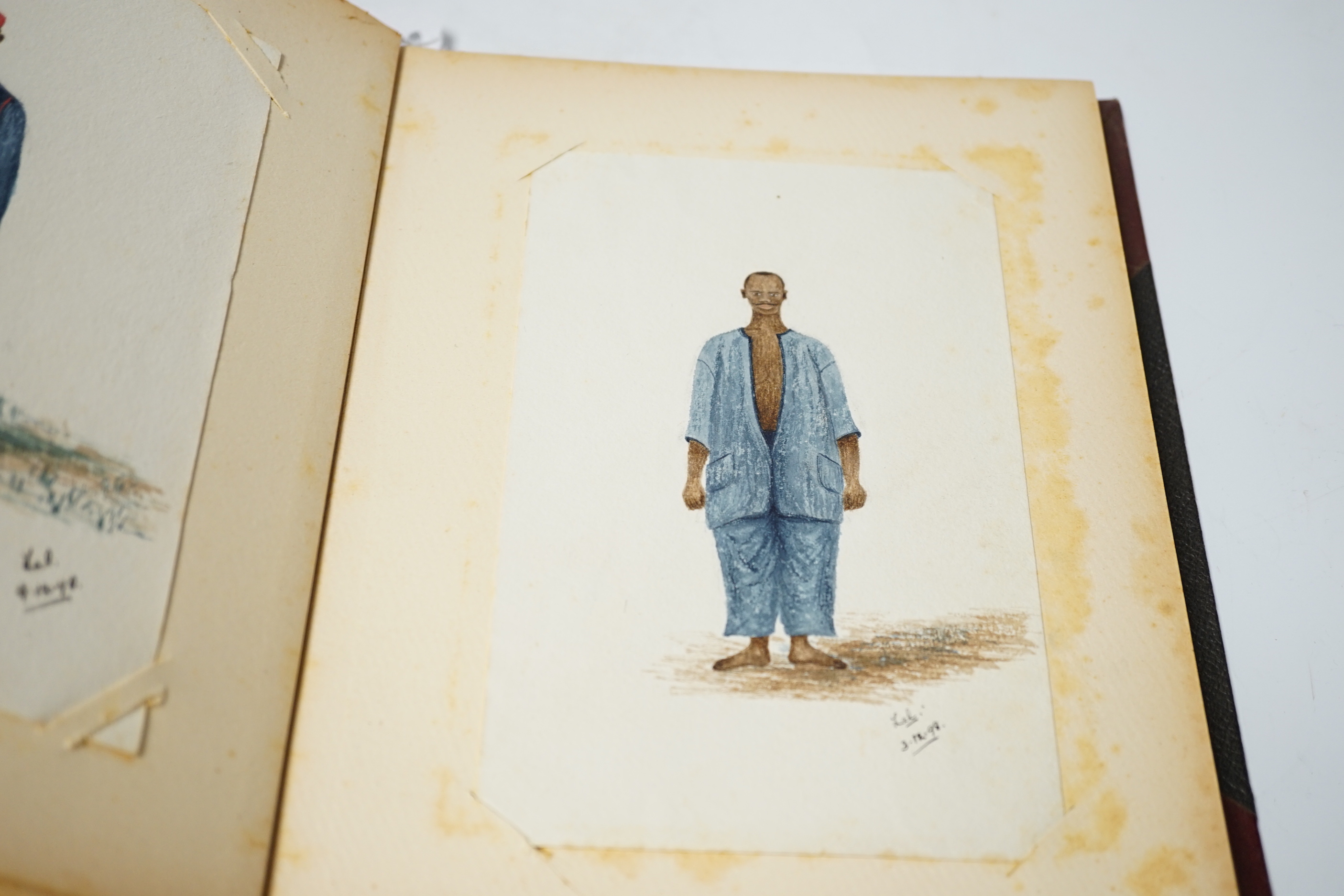 A quantity Nigerian sketches and photographs housed in an album